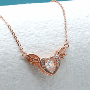 rosegold dancing diamond heart necklace3 1.png