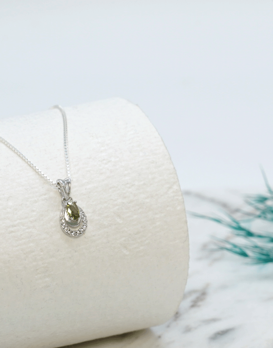 silver mini 2 line oval pendantgreen3.png silver mini 2 line oval pendantgreen3.png