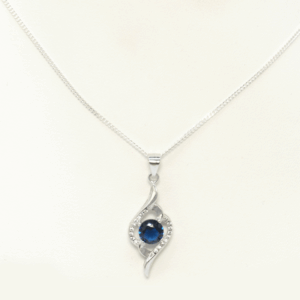 silver round coloured cz pendant blue1.png