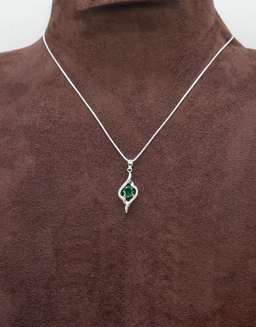 silver round coloured cz pendant green2.jpg silver round coloured cz pendant green2.jpg